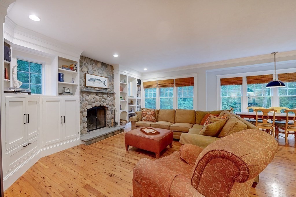 17 Broken Tree Road Medway, MA 02053 - Photo 9 of 40 a living room with furniture and a fireplace