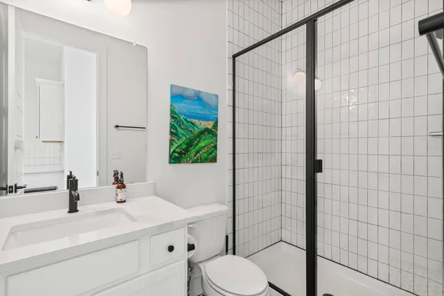 a view of a backyard with wooden fence