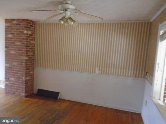 9750 Matzon Road Baltimore, MD 21220 - Photo 9 of 27 a view of an empty room with a window