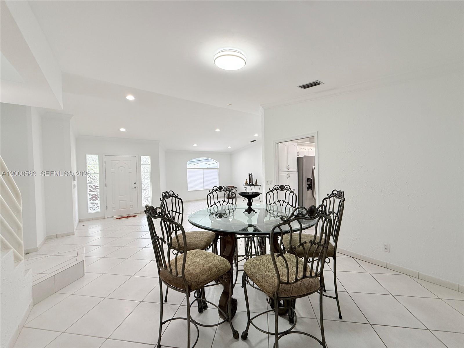 13431 Southwest 32nd Street Miami, FL 33165 - Photo 12 of 77 a view of a dining room with furniture