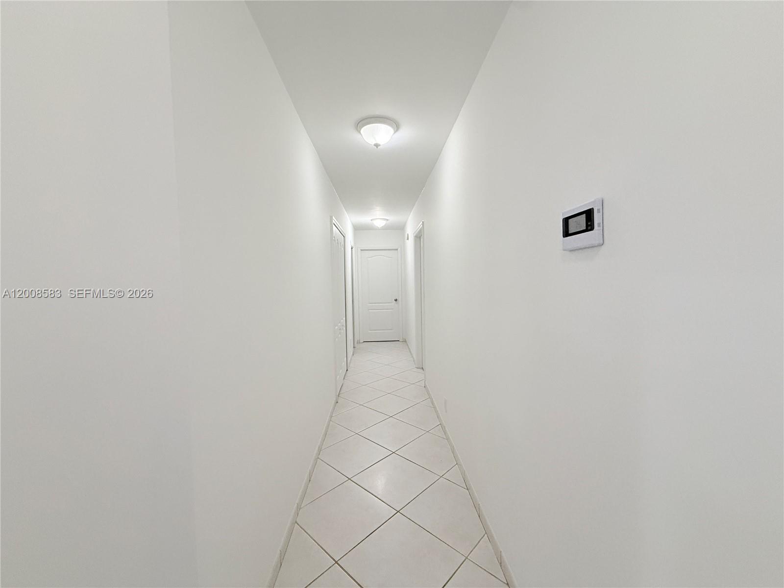 13431 Southwest 32nd Street Miami, FL 33165 - Photo 21 of 77 a view of a hallway