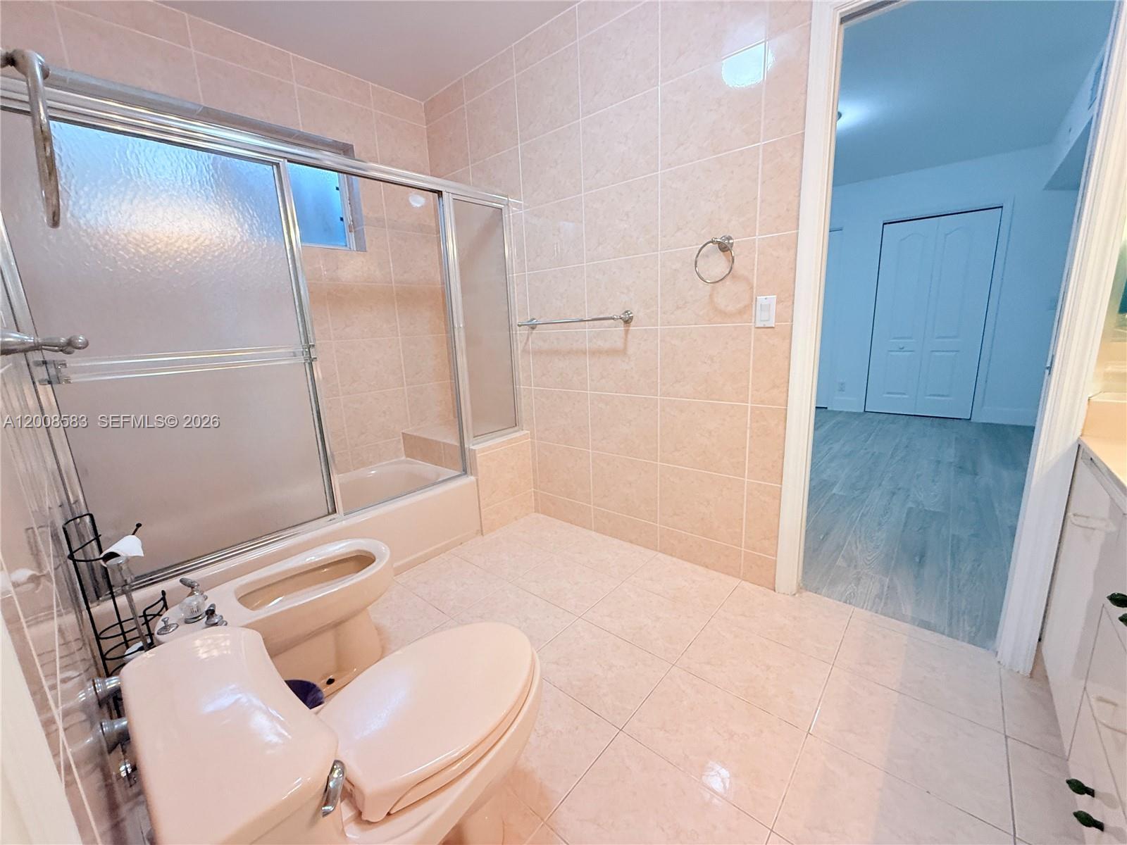 13431 Southwest 32nd Street Miami, FL 33165 - Photo 28 of 77 a bathroom with a sink and a mirror