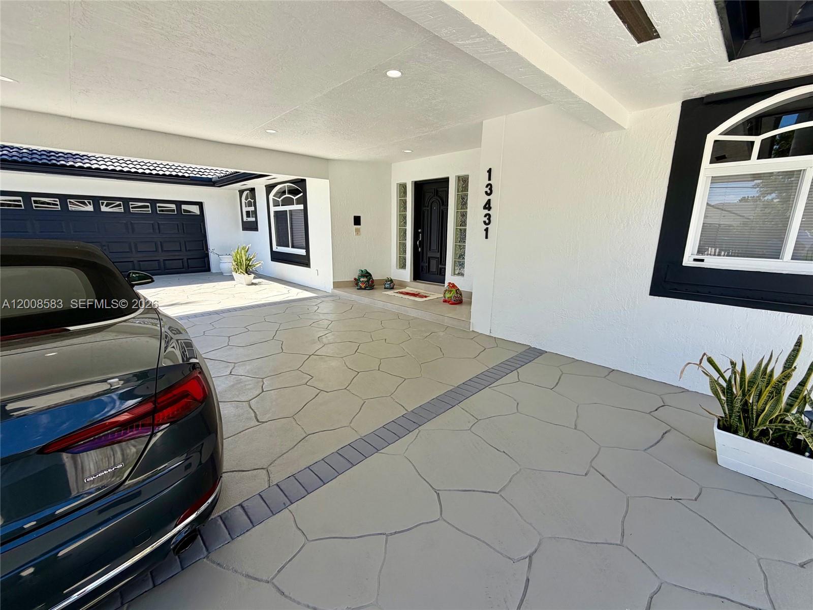 13431 Southwest 32nd Street Miami, FL 33165 - Photo 6 of 77 a view of a livingroom with furniture and natural light