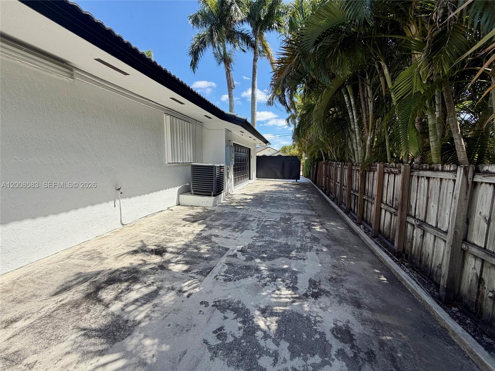 13431 Southwest 32nd Street Miami, FL 33165 - Photo 64 of 77 a view of a house with a backyard