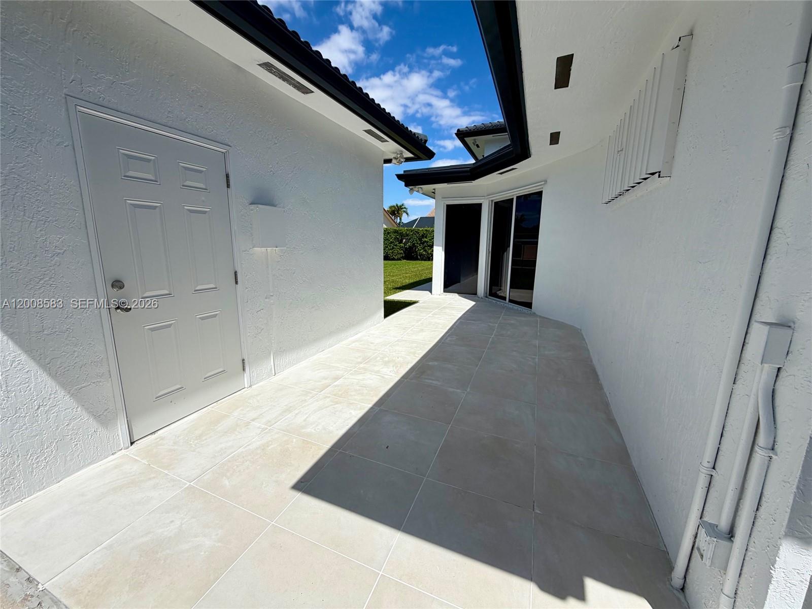 13431 Southwest 32nd Street Miami, FL 33165 - Photo 65 of 77 a view of a hallway