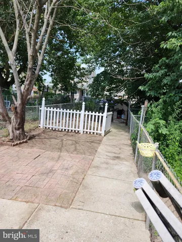 a view of a wooden deck and lake view