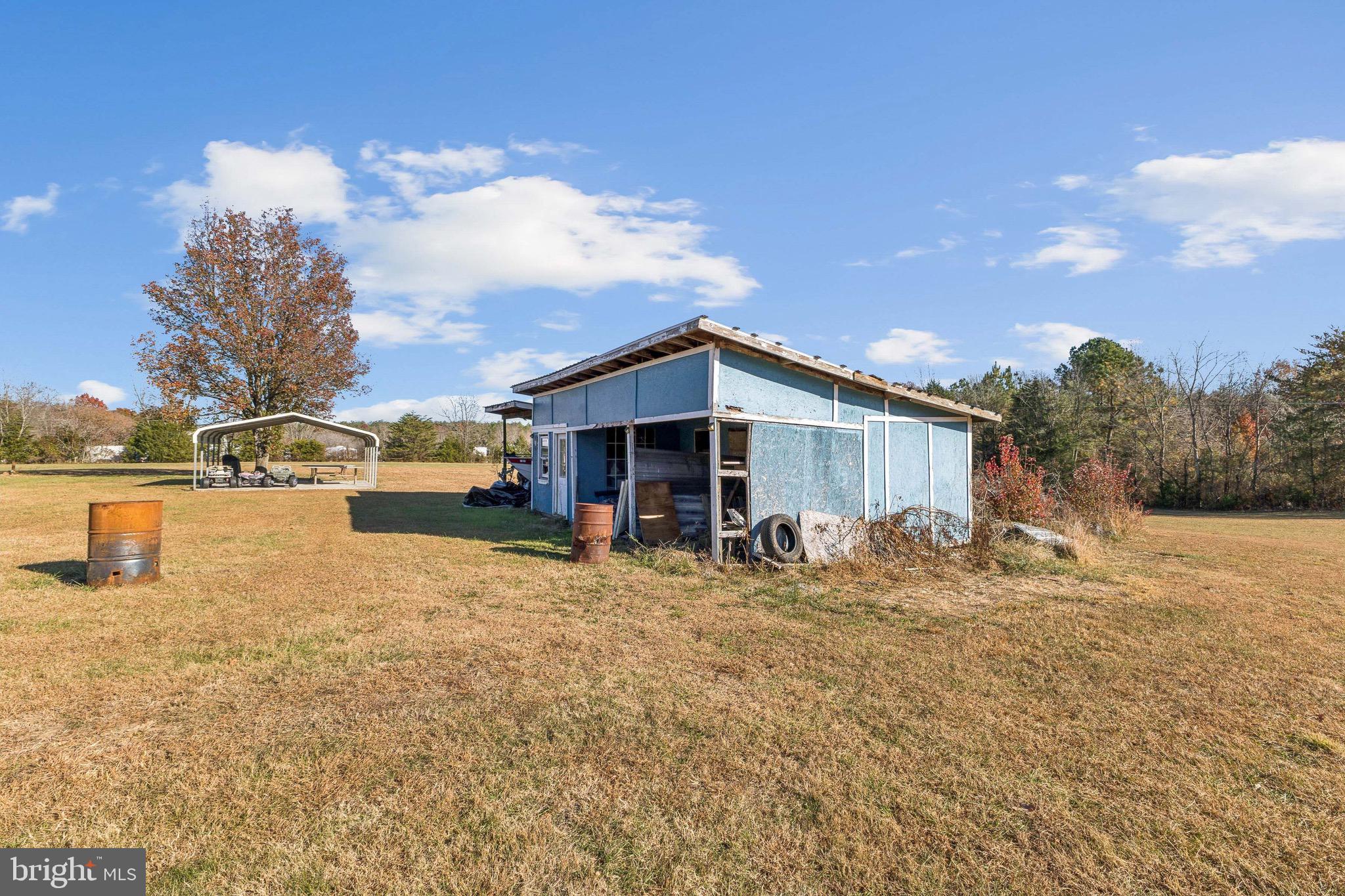 10237 Hook Road Rapidan, VA 22733 - Photo 15 of 37 a view of a house with a yard covered in snow