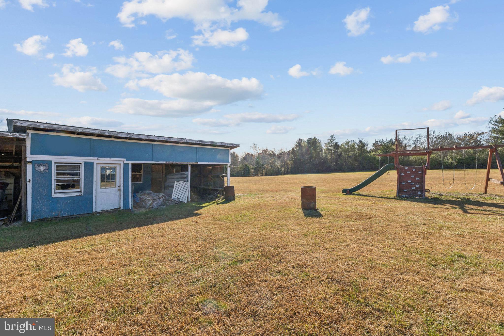 10237 Hook Road Rapidan, VA 22733 - Photo 16 of 37 a view of a house with a yard
