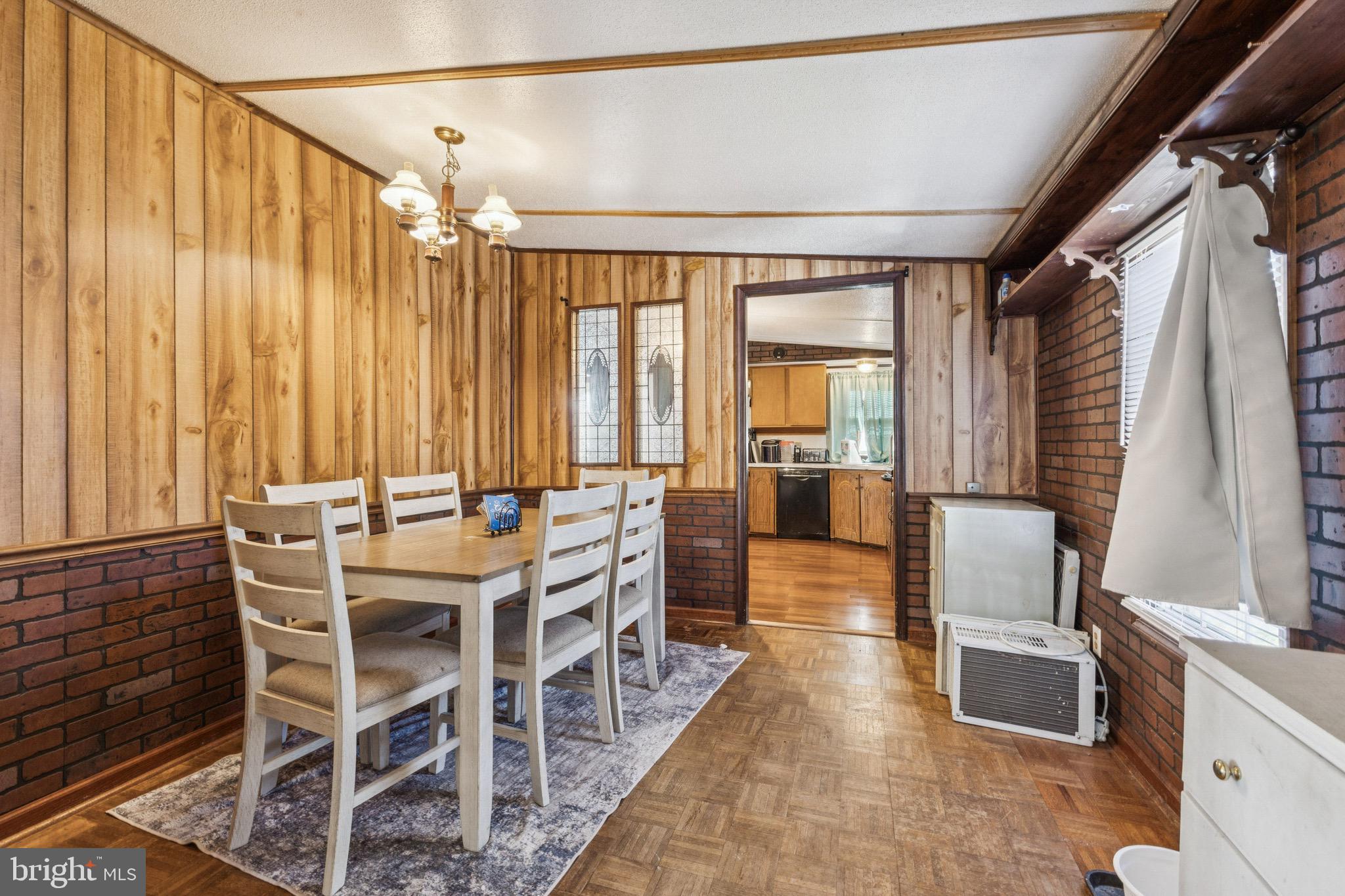 10237 Hook Road Rapidan, VA 22733 - Photo 22 of 37 a view of a dining room with furniture window and outside view