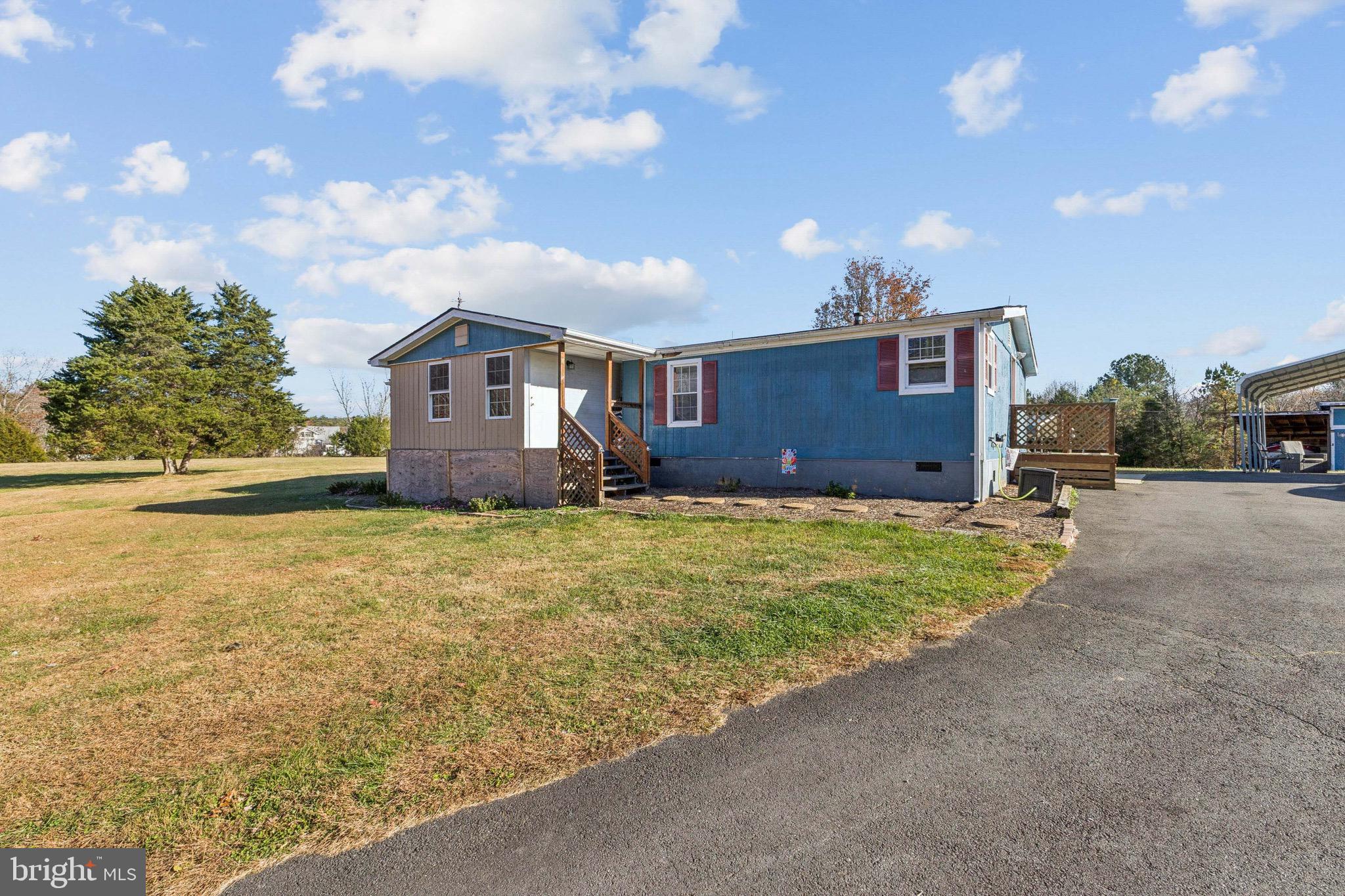 10237 Hook Road Rapidan, VA 22733 - Photo 7 of 37 a front view of a house with a yard