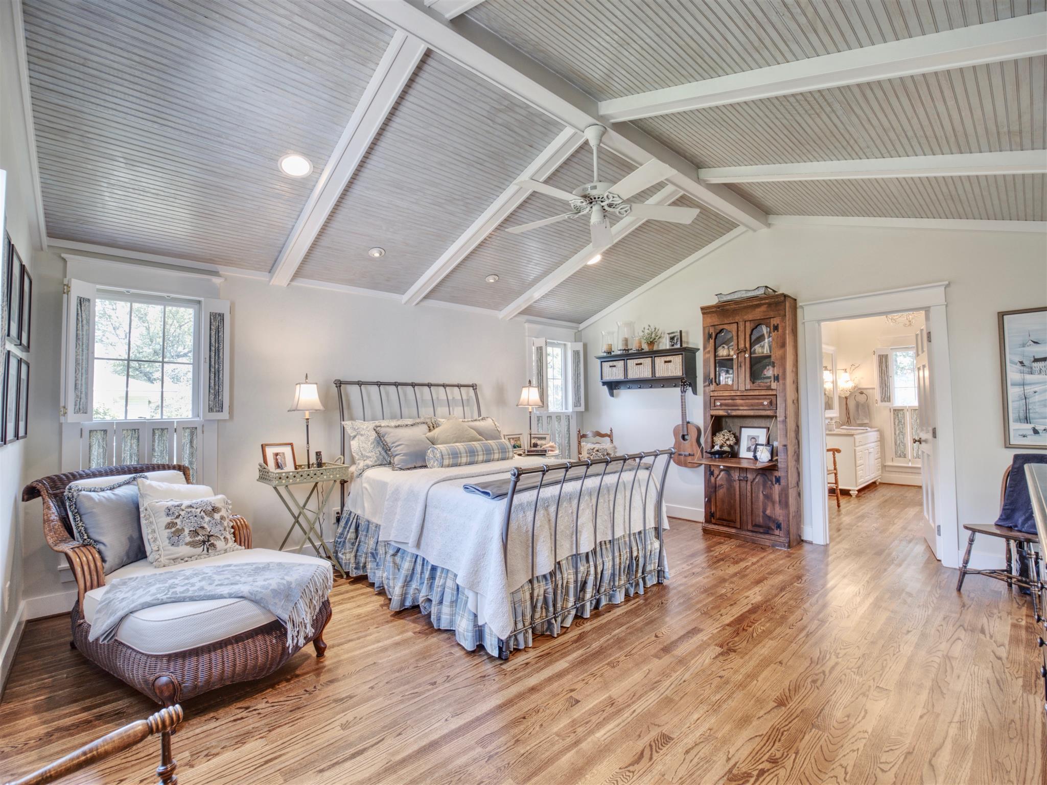 1802 Indian Hills Road Lebanon, TN 37087 - Photo 3 of 29 Master bedroom is just magazine perfect. Beadboard ceiling in a soft blue and hardwood floors help create an oasis