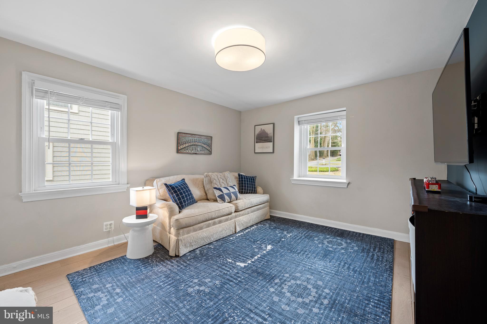 412 Iven Avenue Wayne, PA 19087 - Photo 12 of 26 a living room with furniture and a flat screen tv