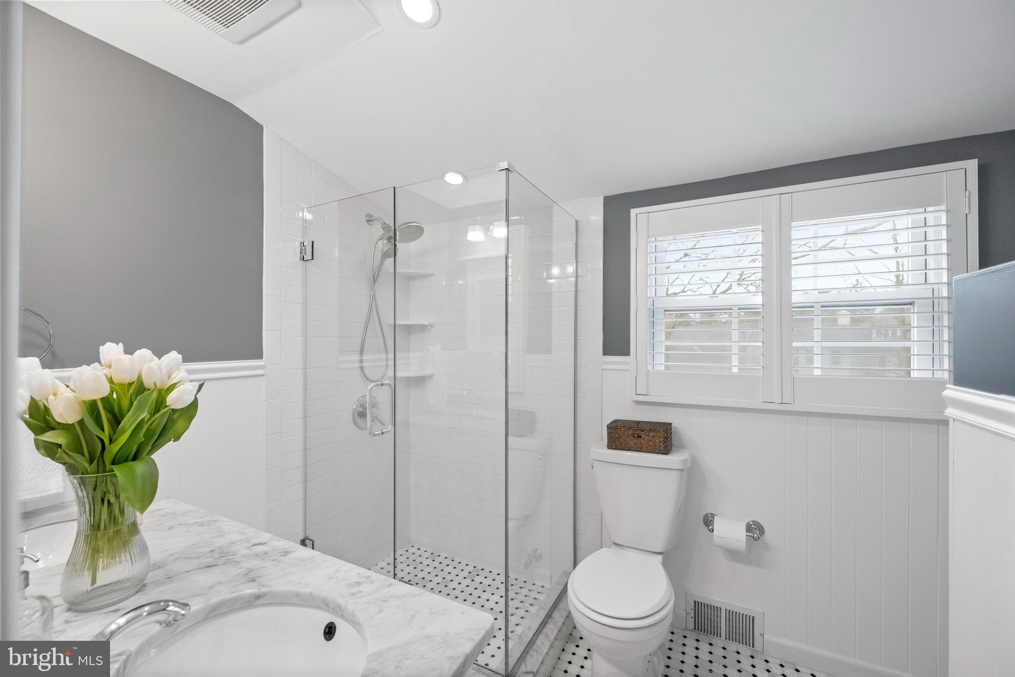 412 Iven Avenue Wayne, PA 19087 - Photo 22 of 26 a bathroom with a sink a toilet and shower