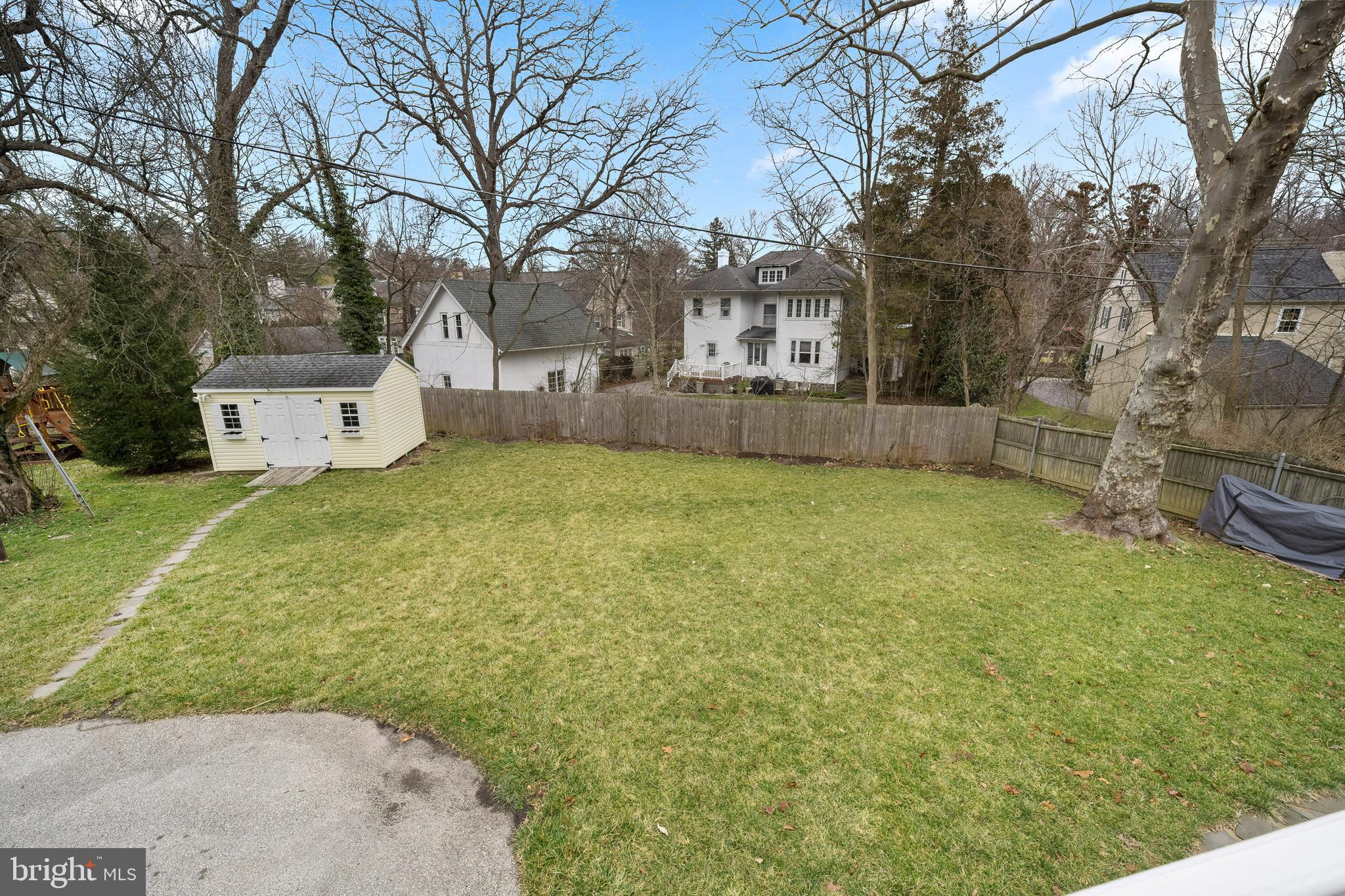 412 Iven Avenue Wayne, PA 19087 - Photo 26 of 26 a view of a house with a yard covered in snow
