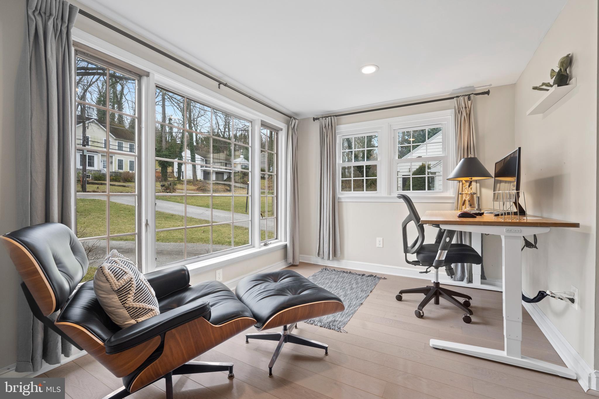 412 Iven Avenue Wayne, PA 19087 - Photo 6 of 26 a living room with furniture and floor to ceiling windows