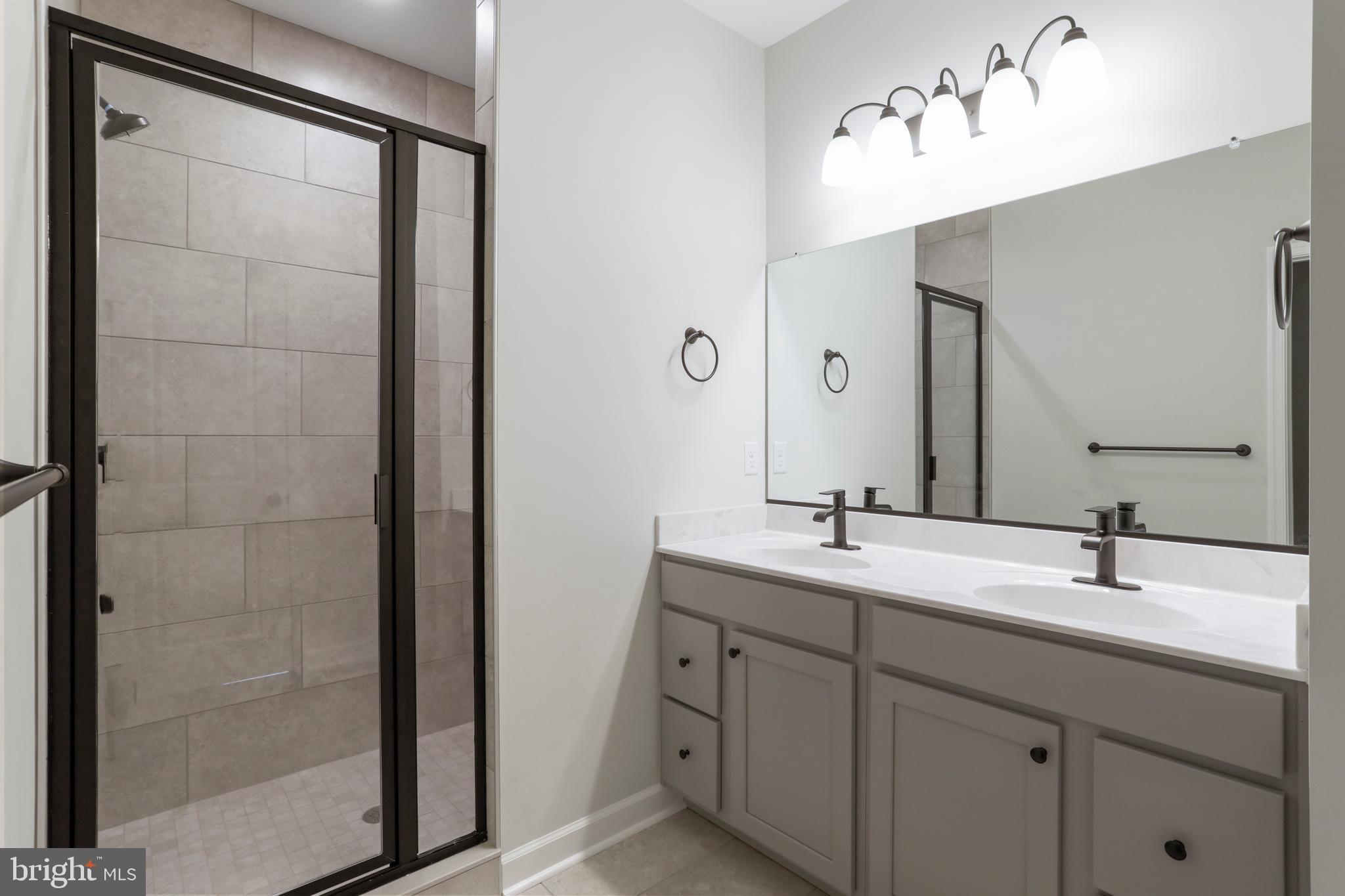32 Larimar Lane Inwood, WV 25428 - Photo 19 of 28 a bathroom with a double vanity sink mirror and