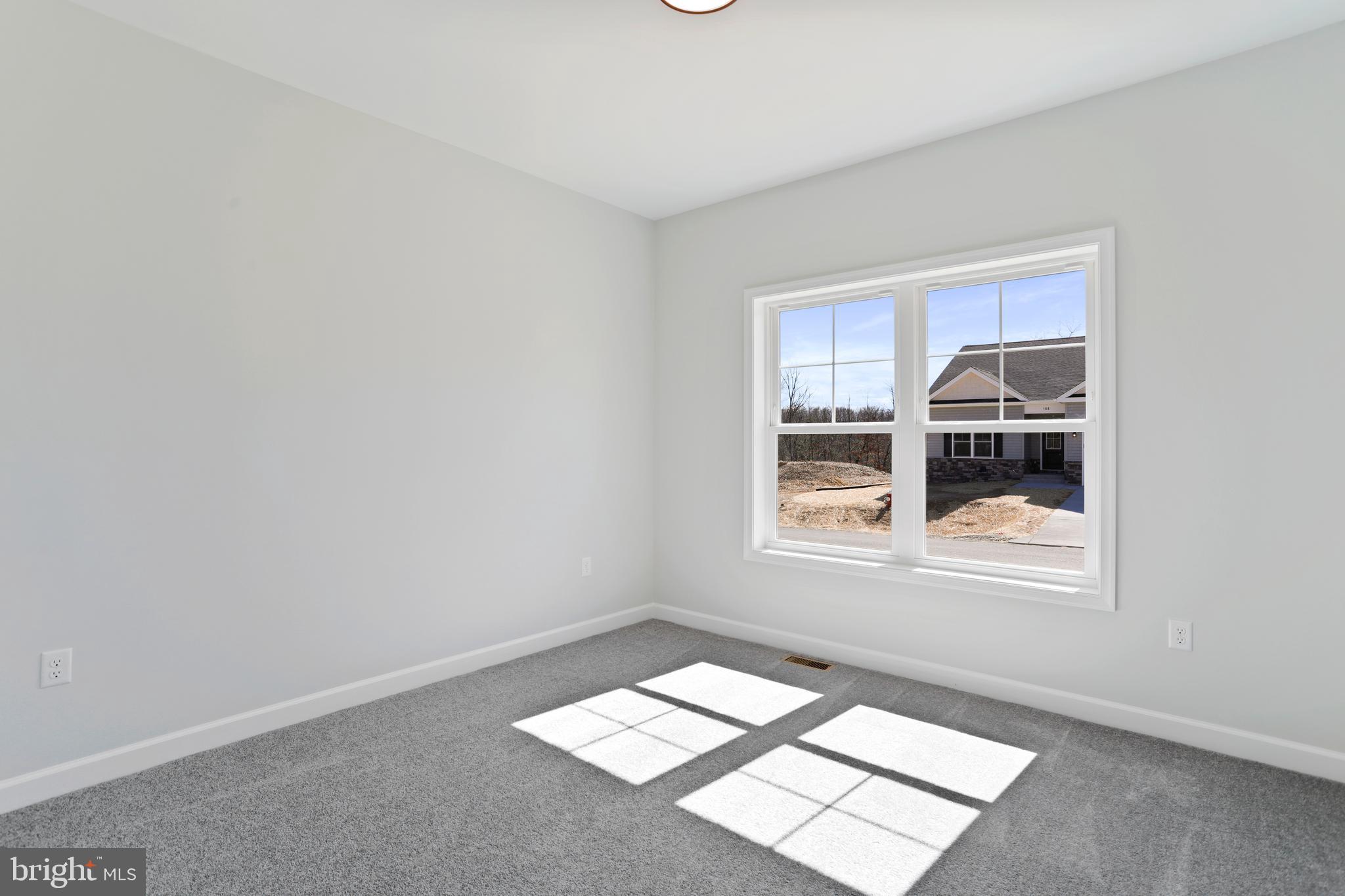 32 Larimar Lane Inwood, WV 25428 - Photo 22 of 28 an empty room with a window