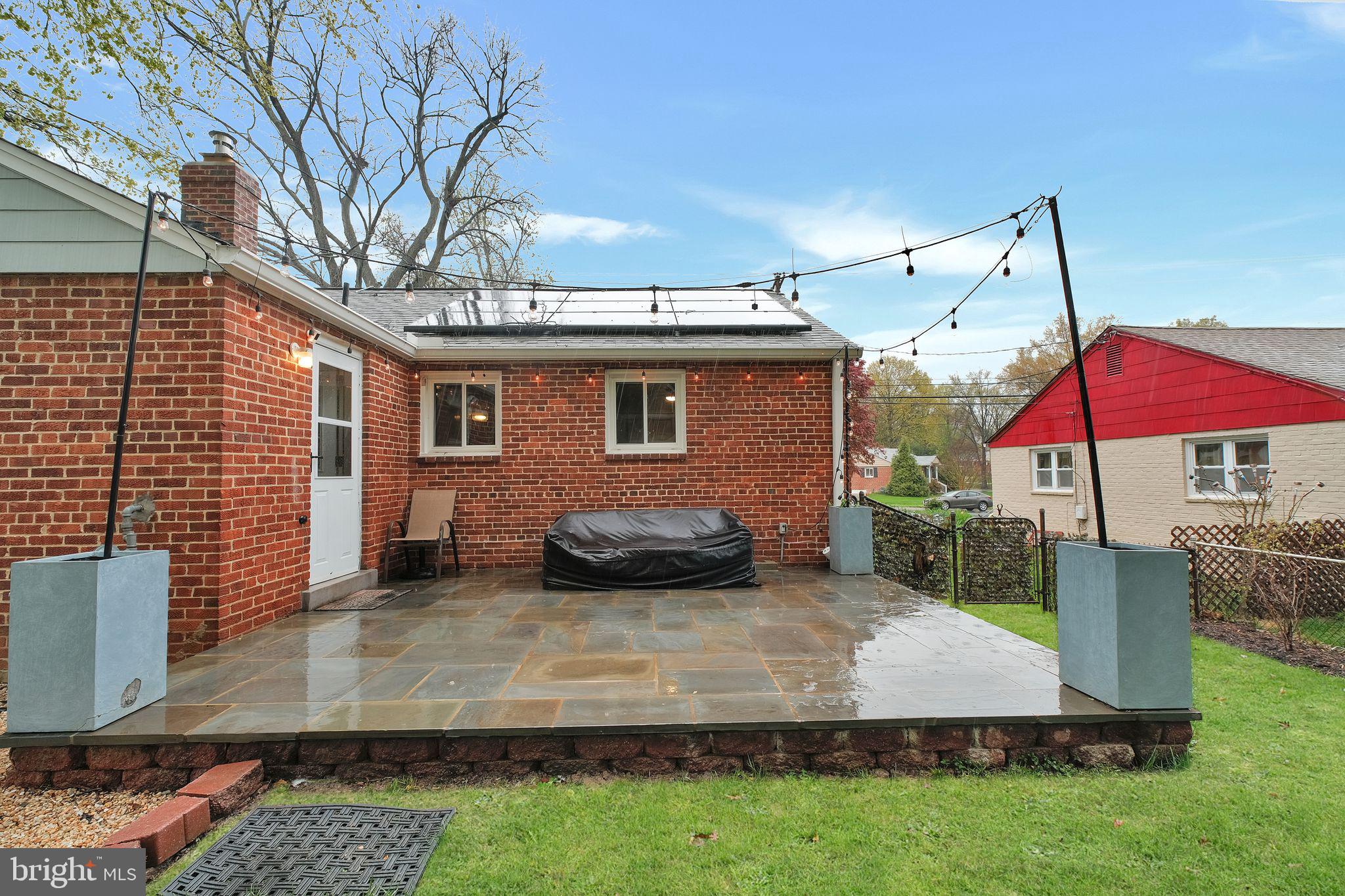 2204 Prichard Road Silver Spring, MD 20902 - Photo 20 of 26 a view of a house with backyard and sitting area