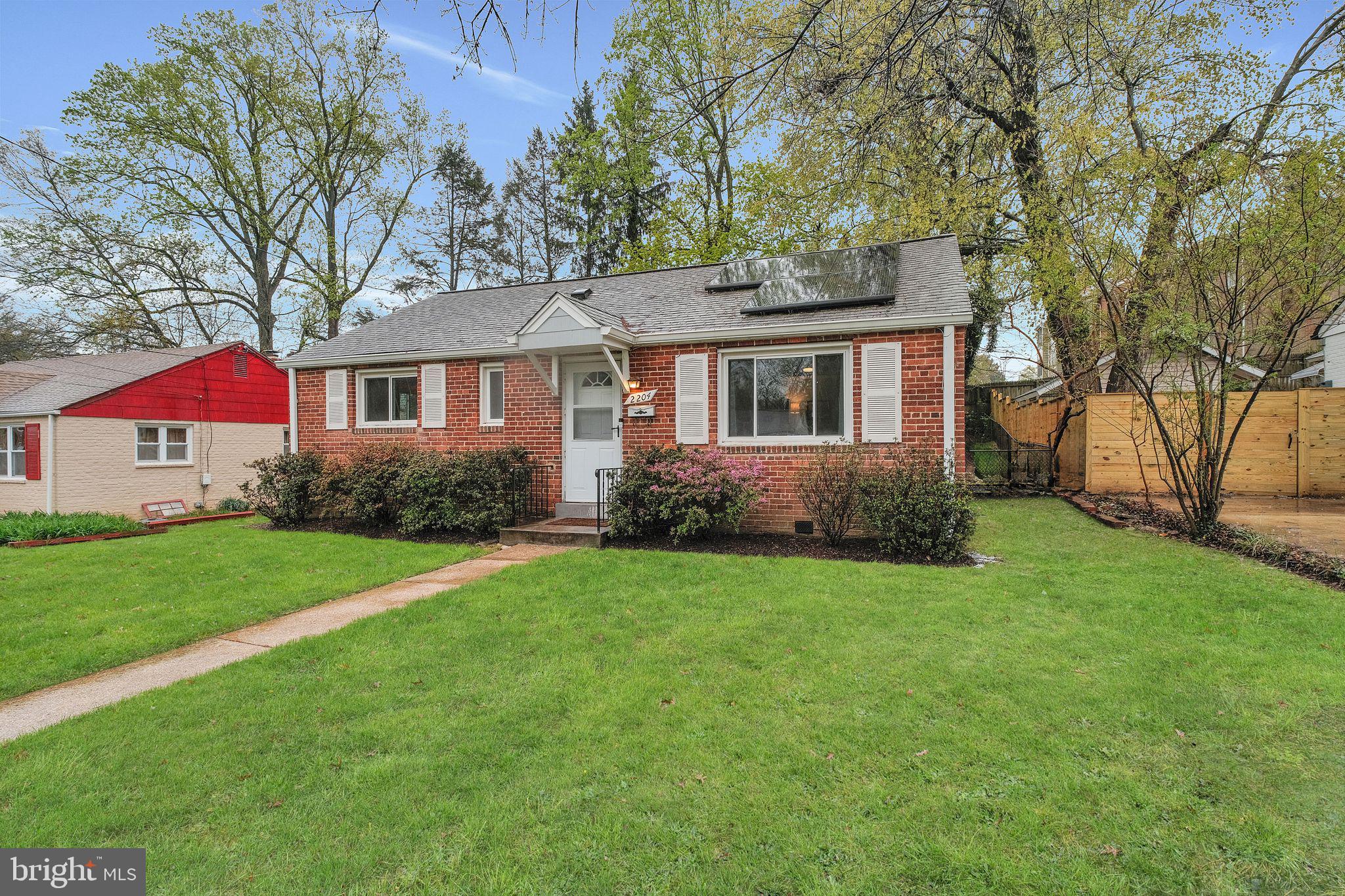 2204 Prichard Road Silver Spring, MD 20902 - Photo 2 of 26 front view of a house with a yard
