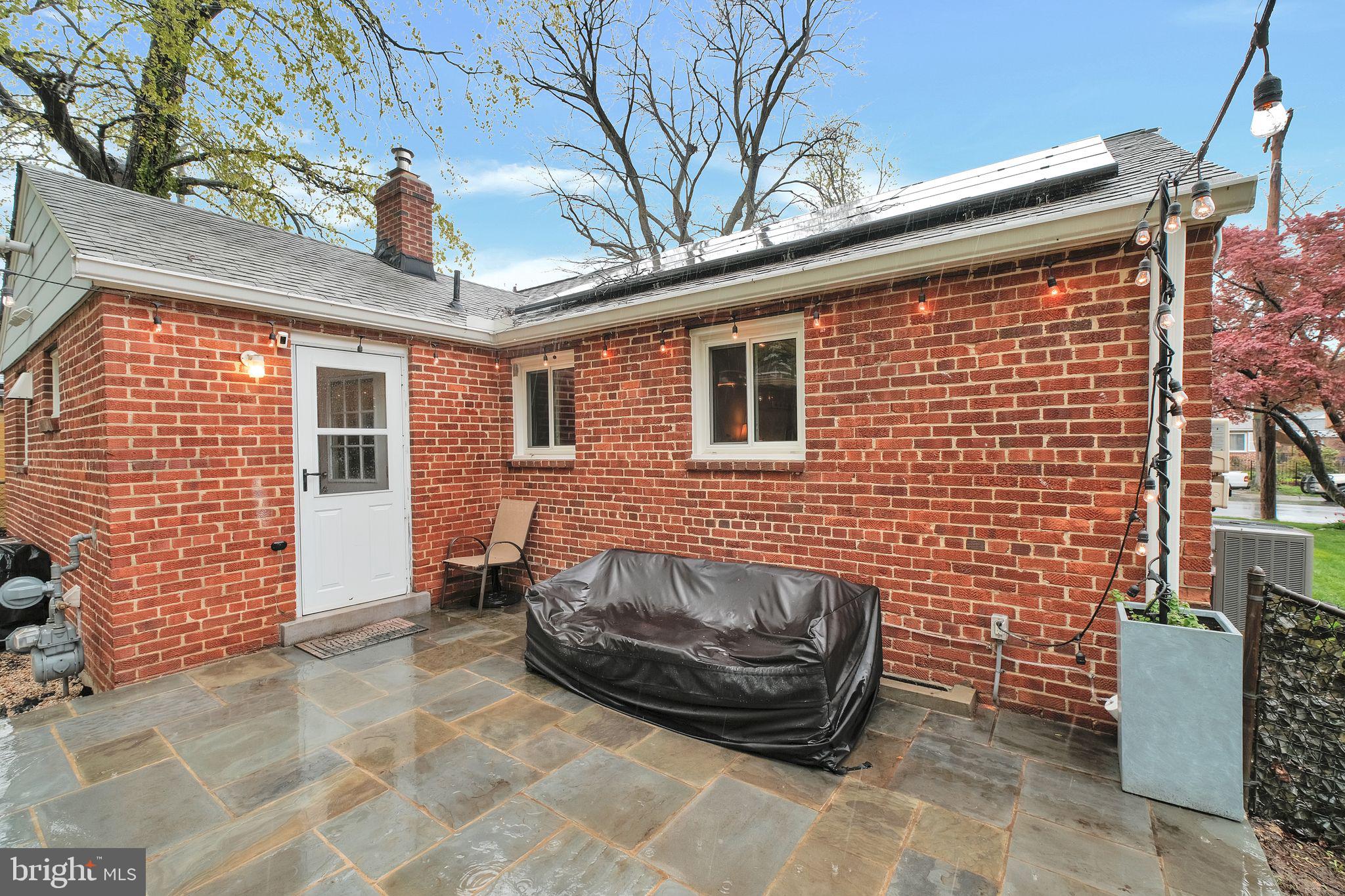 2204 Prichard Road Silver Spring, MD 20902 - Photo 21 of 26 a view of a patio with chair and tables