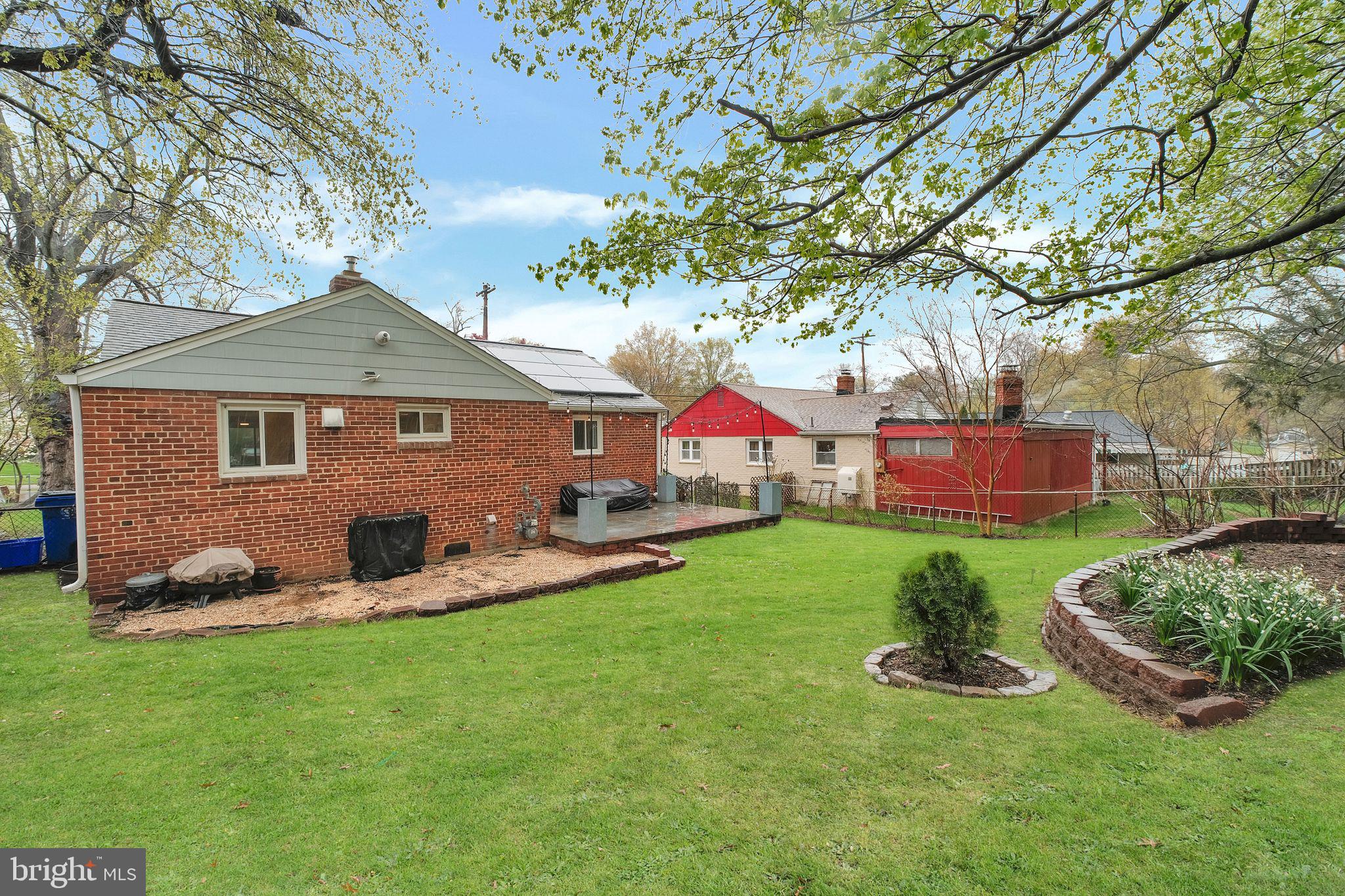 2204 Prichard Road Silver Spring, MD 20902 - Photo 23 of 26 a front view of a house with garden