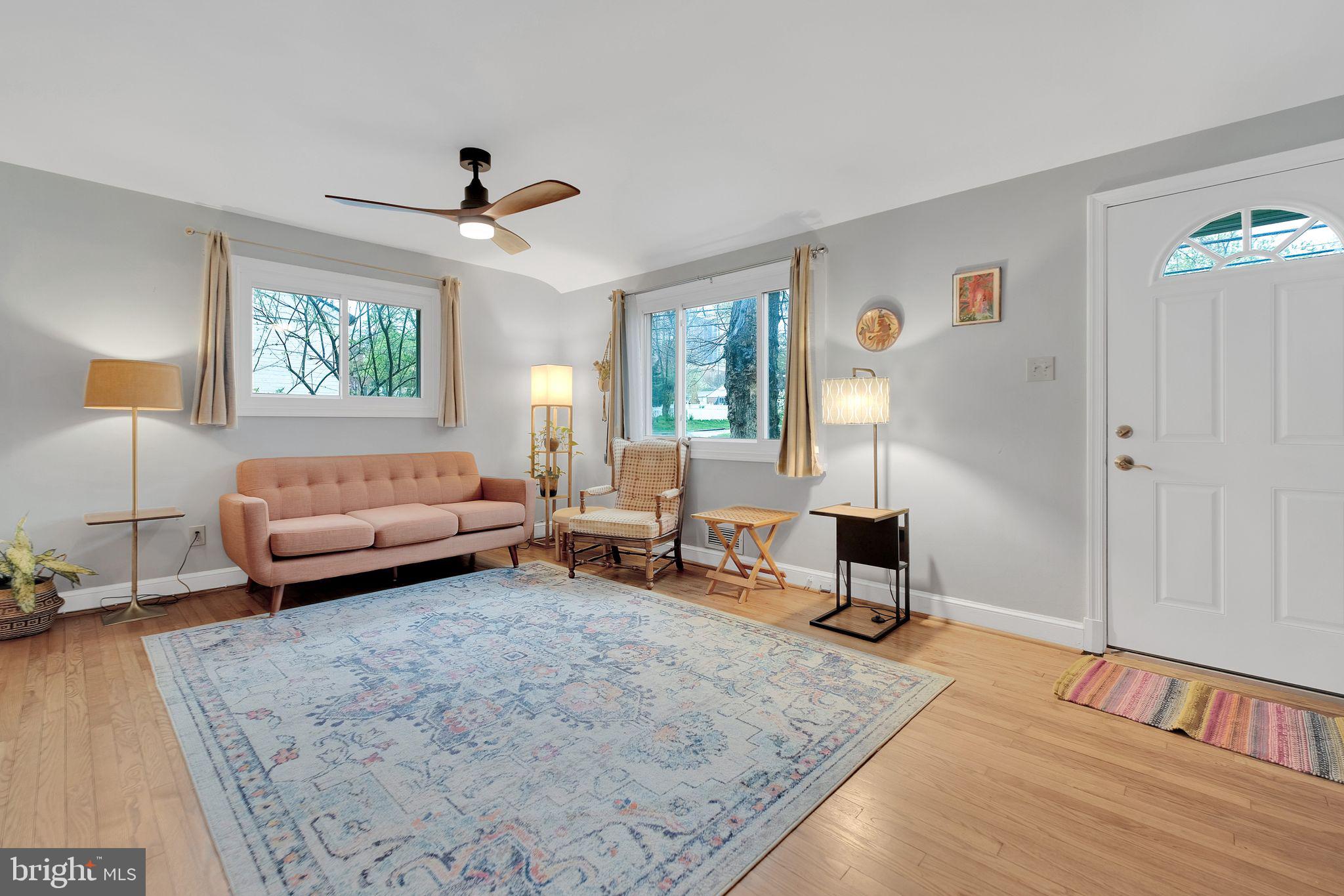 2204 Prichard Road Silver Spring, MD 20902 - Photo 3 of 26 a living room with furniture and a table