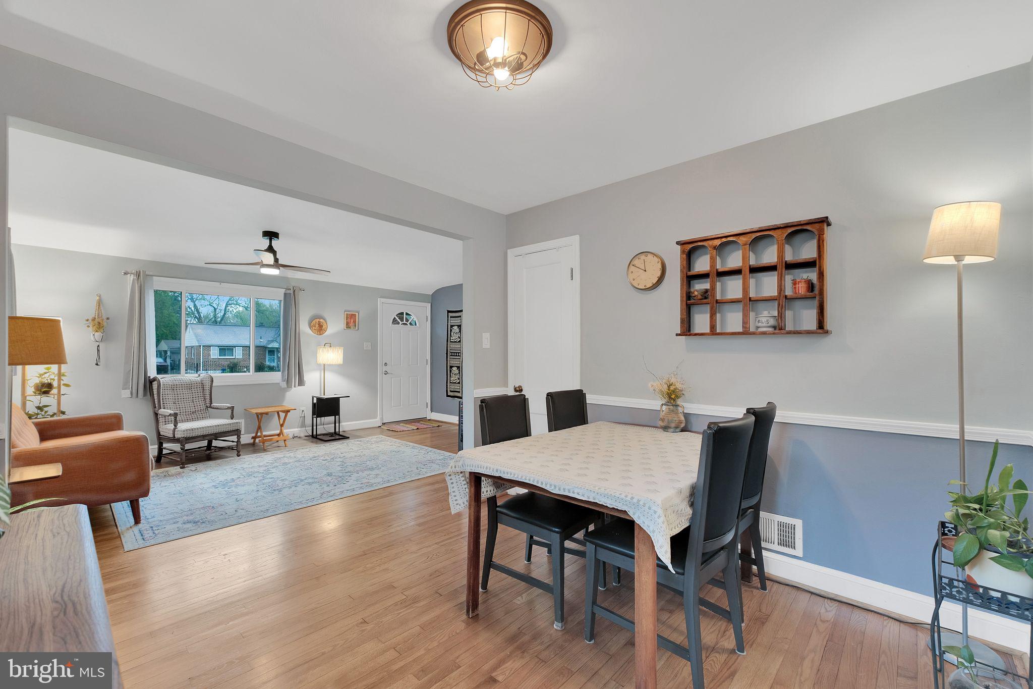 2204 Prichard Road Silver Spring, MD 20902 - Photo 7 of 26 a view of a dining room with furniture and wooden floor