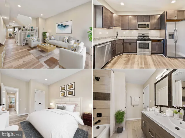 a view of kitchen with kitchen island stainless steel appliances refrigerator stove microwave and cabinets