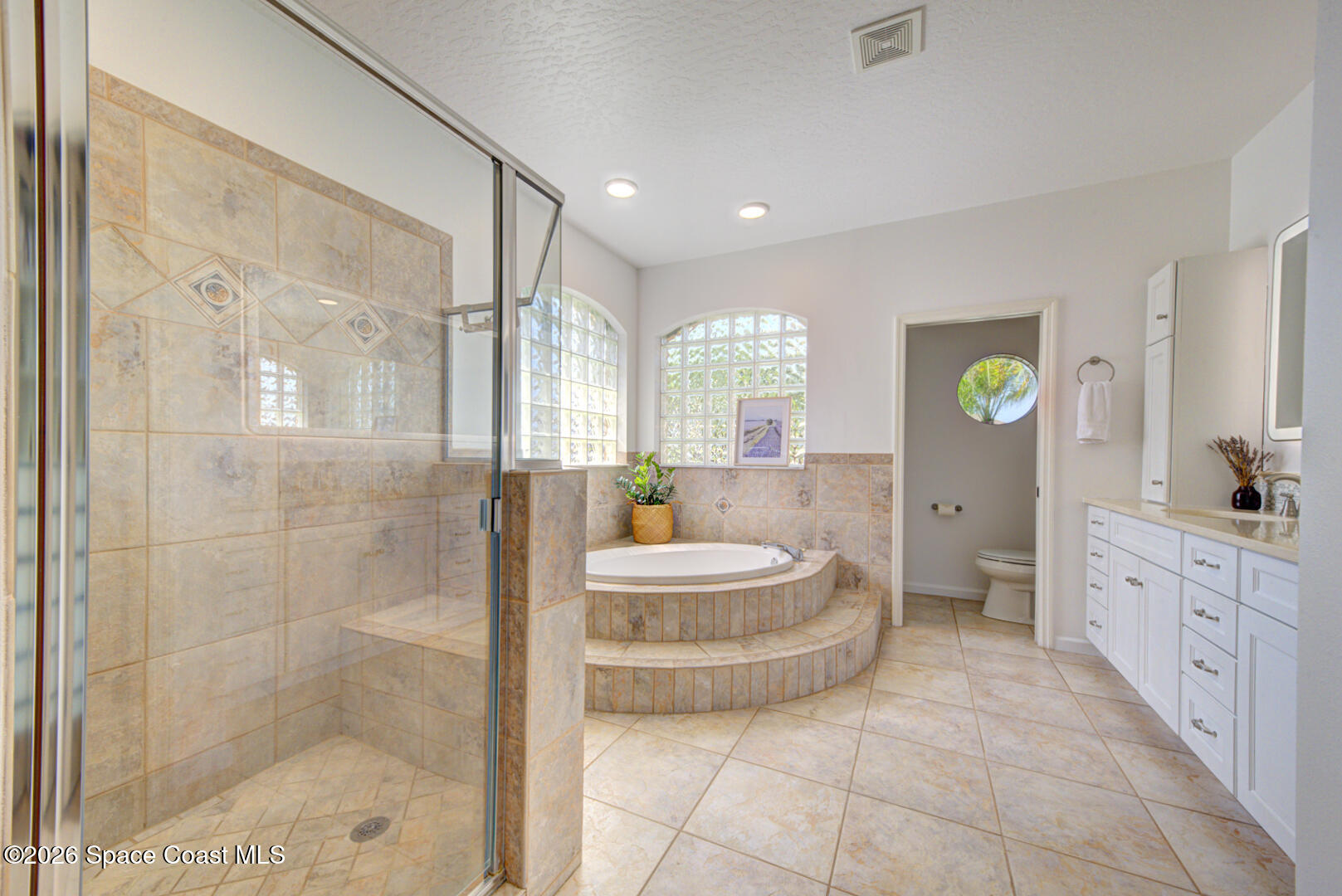 4070 Stoney Point Road Melbourne, FL 32940 - Photo 43 of 78 primary bathroom shower & tub