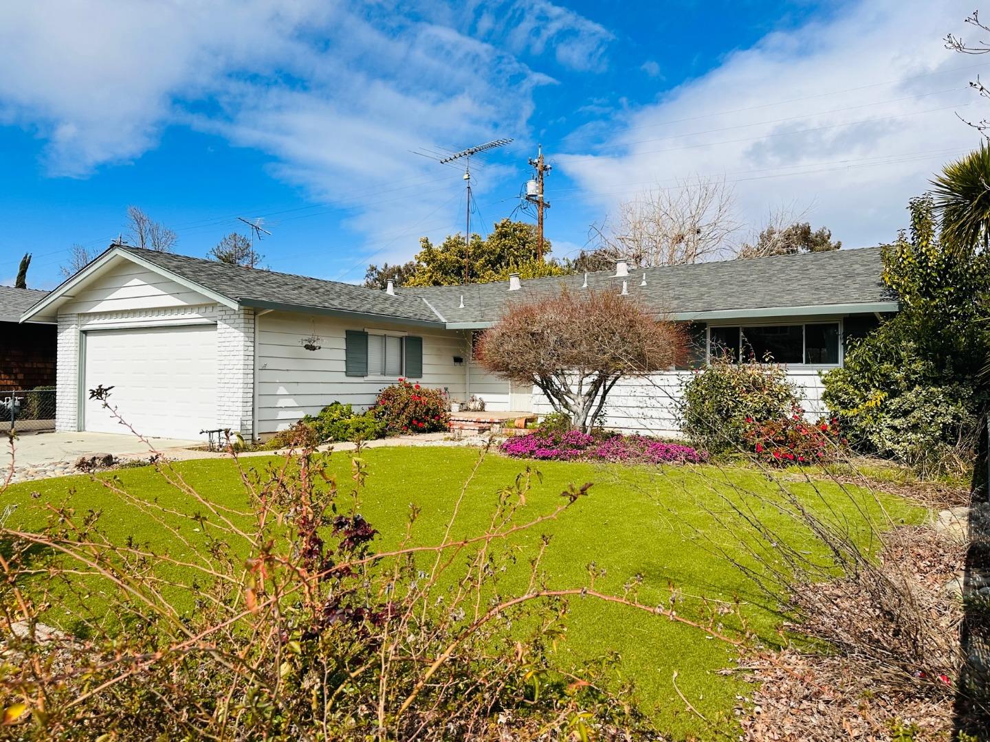 941 Springfield Drive Campbell, CA 95008 - Photo 1 of 22 a front view of a house with a yard