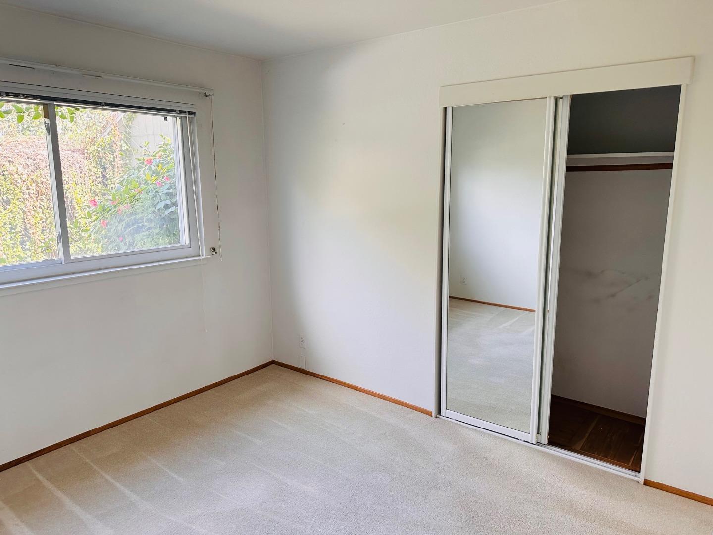 941 Springfield Drive Campbell, CA 95008 - Photo 13 of 22 an empty room with windows and closet