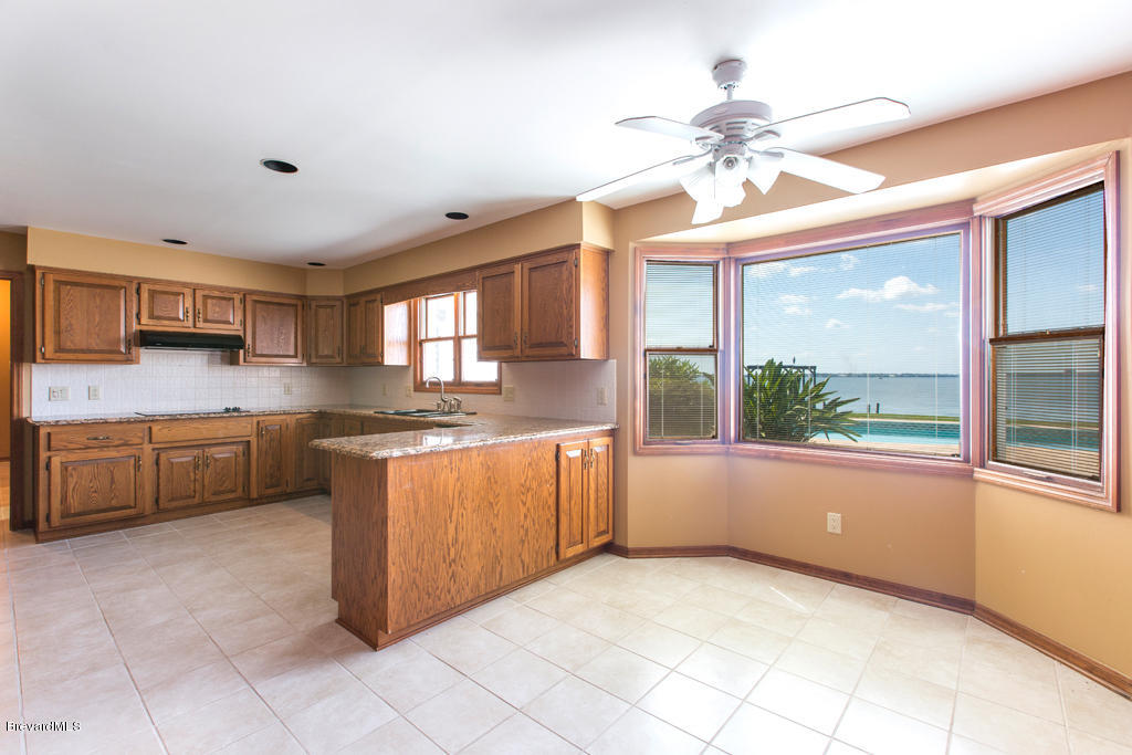 2840 North Riverside Drive Indialantic, FL 32903 - Photo 6 of 25 Breakfast Area and Kitchen.jpg