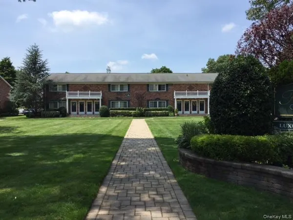 a front view of house with yard