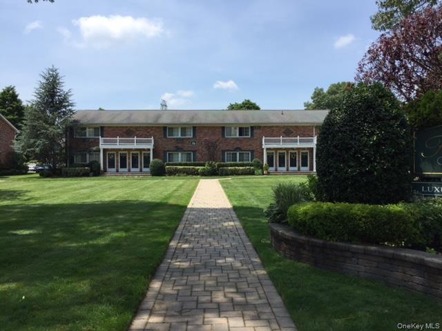 a front view of house with yard