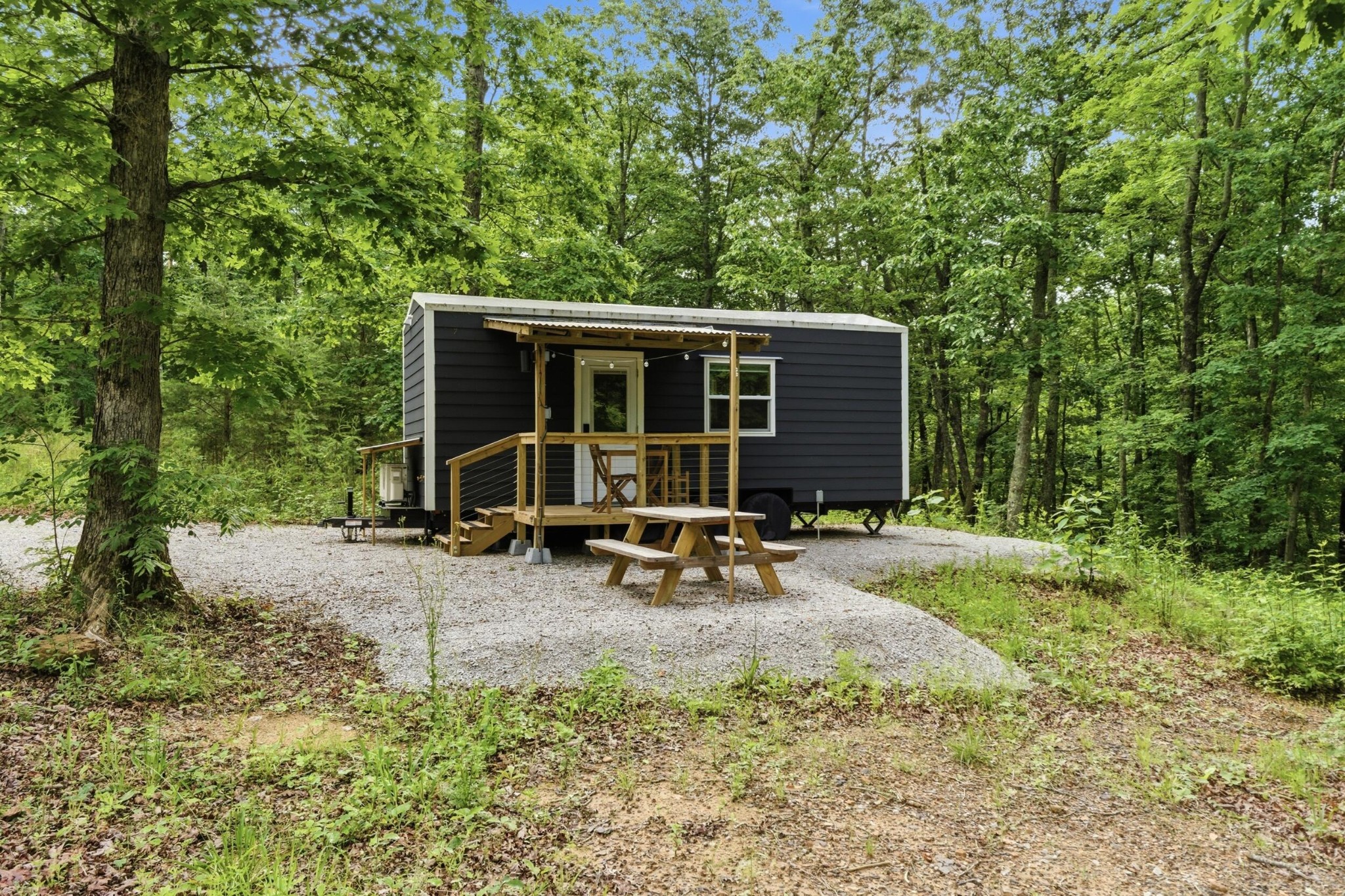 739 South Moore Road Rising Fawn, GA 30738 - Photo 17 of 26 a view of a house with backyard sitting area and garden