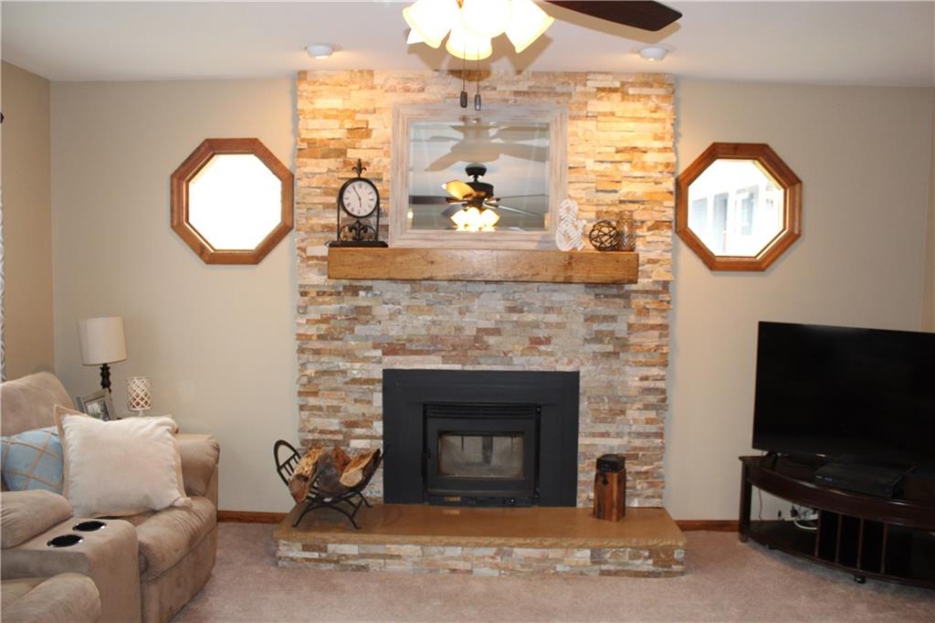 4200 Tuscarawas Road Beaver, PA 15009 - Photo 3 of 24 Wood Burner Insert is Able to Be Used as an Additional Heat Source for the Home-Monthly Gas Bills are Average of $40 per Month-Custom Hearth and Mantle Finish the Look