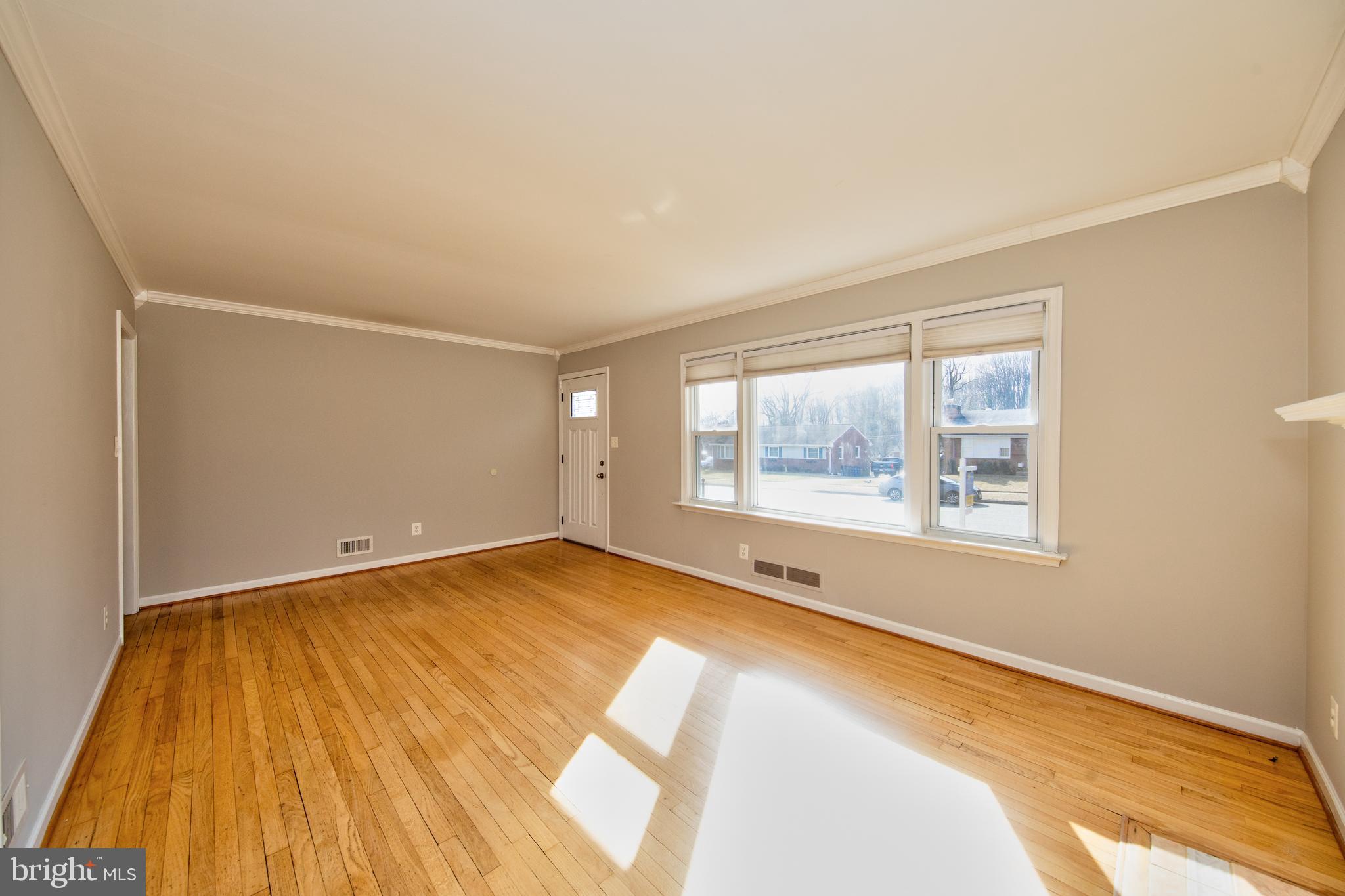 25 North Reed Street Bel Air, MD 21014 - Photo 6 of 32 Spacious living room w/ fresh paint & Harwood fls