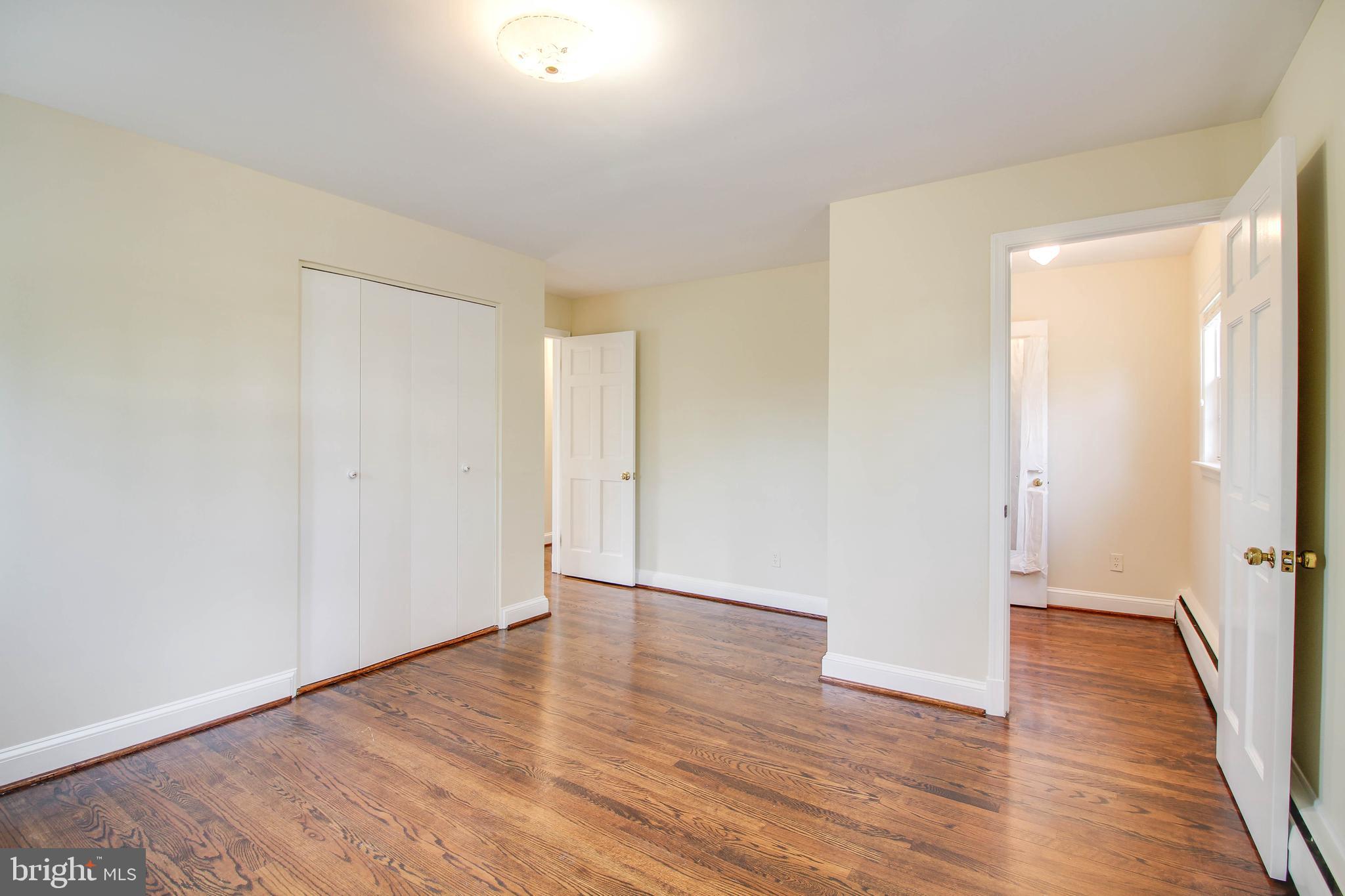 14 Overhill Road Catonsville, MD 21228 - Photo 19 of 38 a view of an empty room with wooden floor