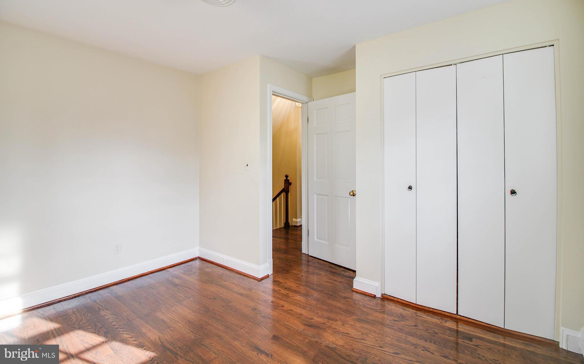 14 Overhill Road Catonsville, MD 21228 - Photo 27 of 38 a view of an empty room with wooden floor