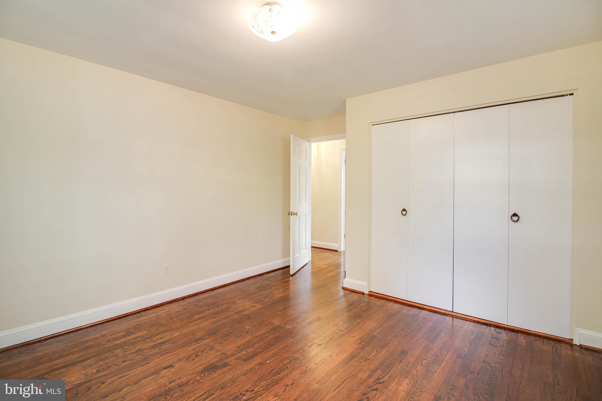 14 Overhill Road Catonsville, MD 21228 - Photo 29 of 38 a view of an empty room with wooden floor