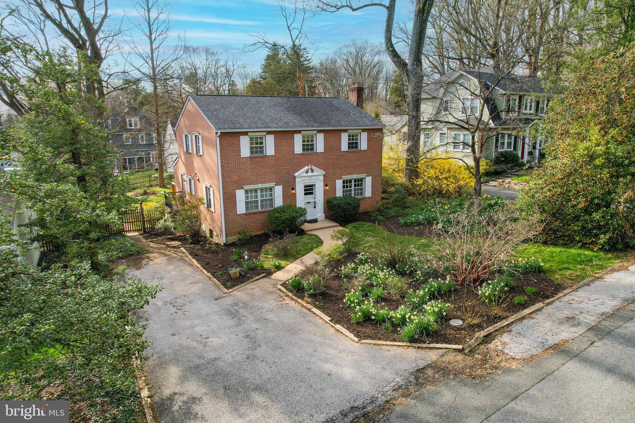 14 Overhill Road Catonsville, MD 21228 - Photo 35 of 38 a front view of a house with a yard and potted plants