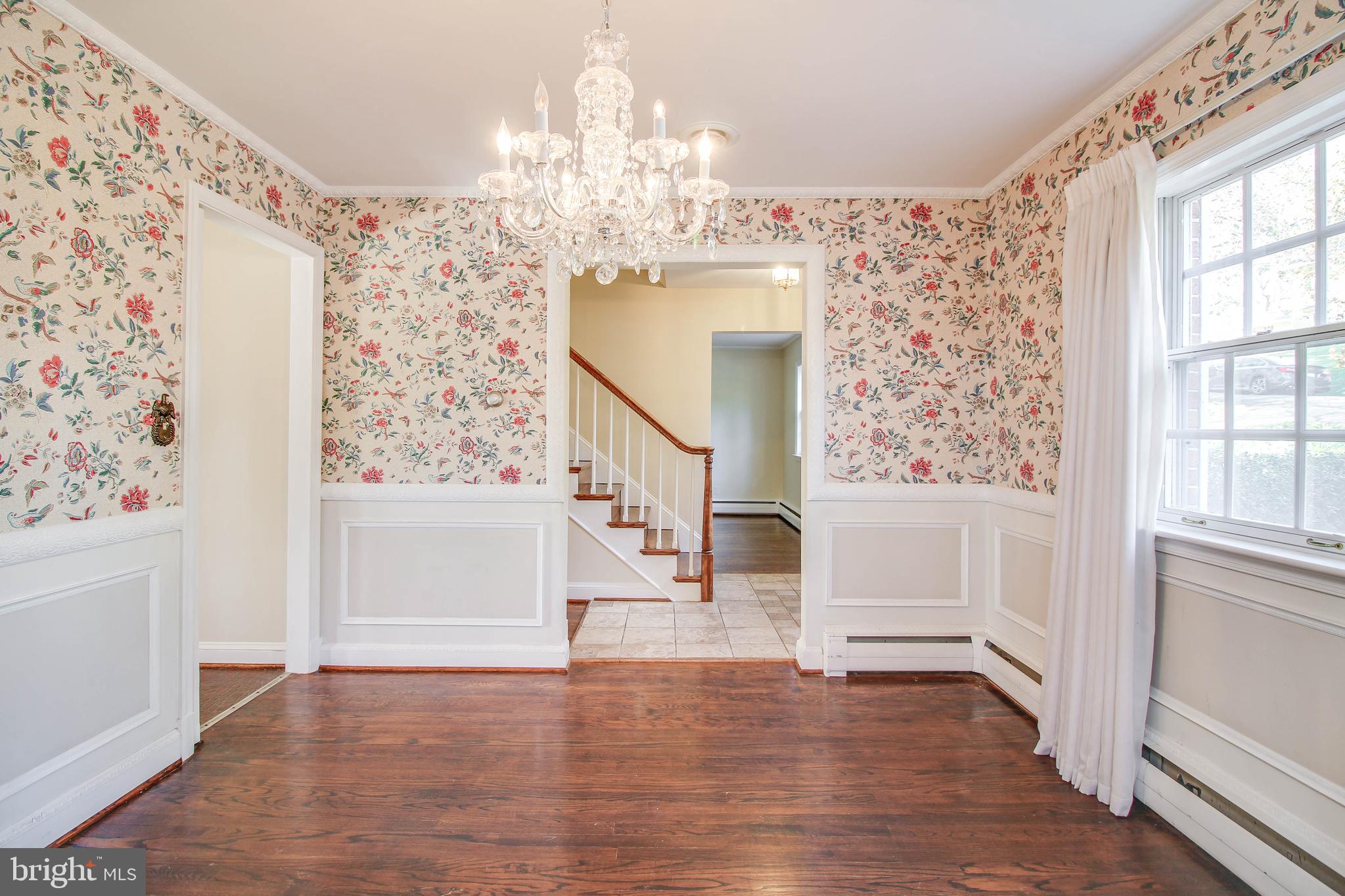 14 Overhill Road Catonsville, MD 21228 - Photo 8 of 38 a view of hall way with furniture and chandelier