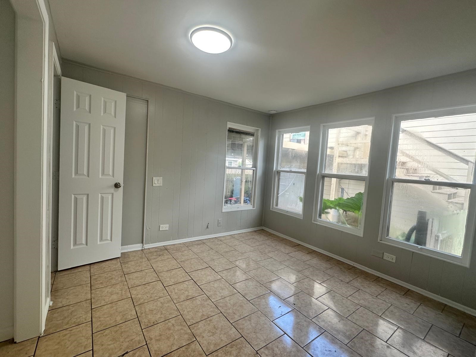 918 West 5th Street, Unit 1 Freeport, TX 77541 - Photo 12 of 21 a view of an empty room with window