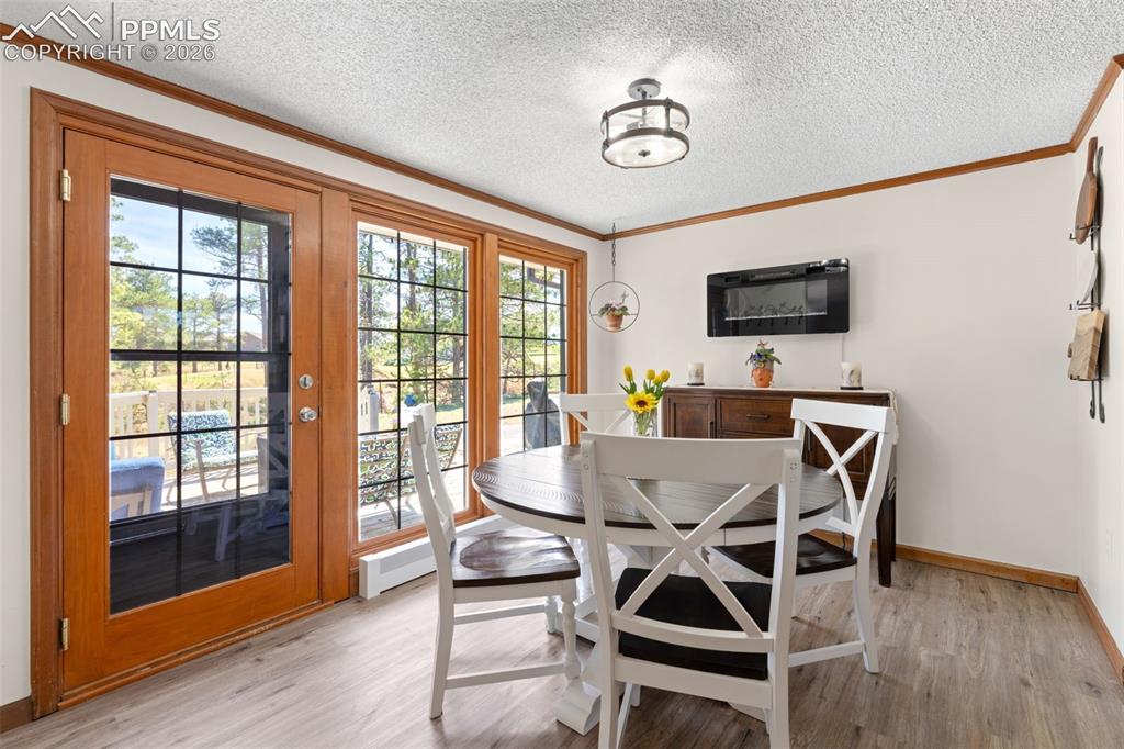 1851 Buttercup Road Elizabeth, CO 80107 - Photo 16 of 47 a dining room with furniture and window