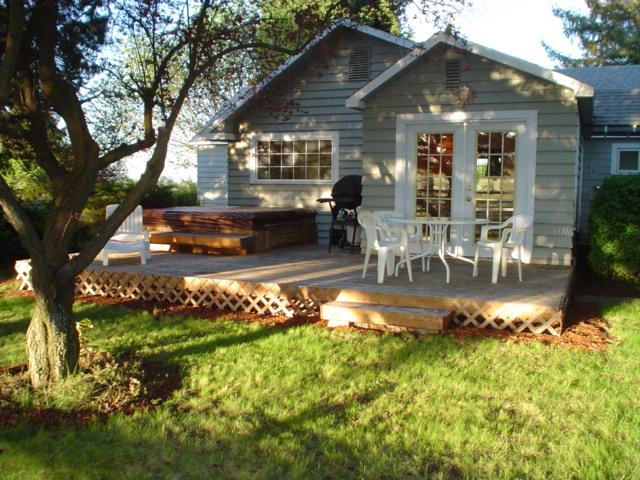 3410 South Stanton Road Yakima, WA 98903 - Photo 8 of 10 a front view of a house with garden