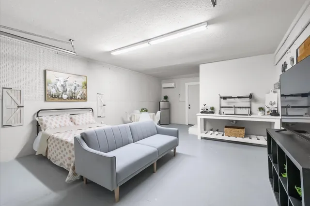 a living room with furniture and a couch