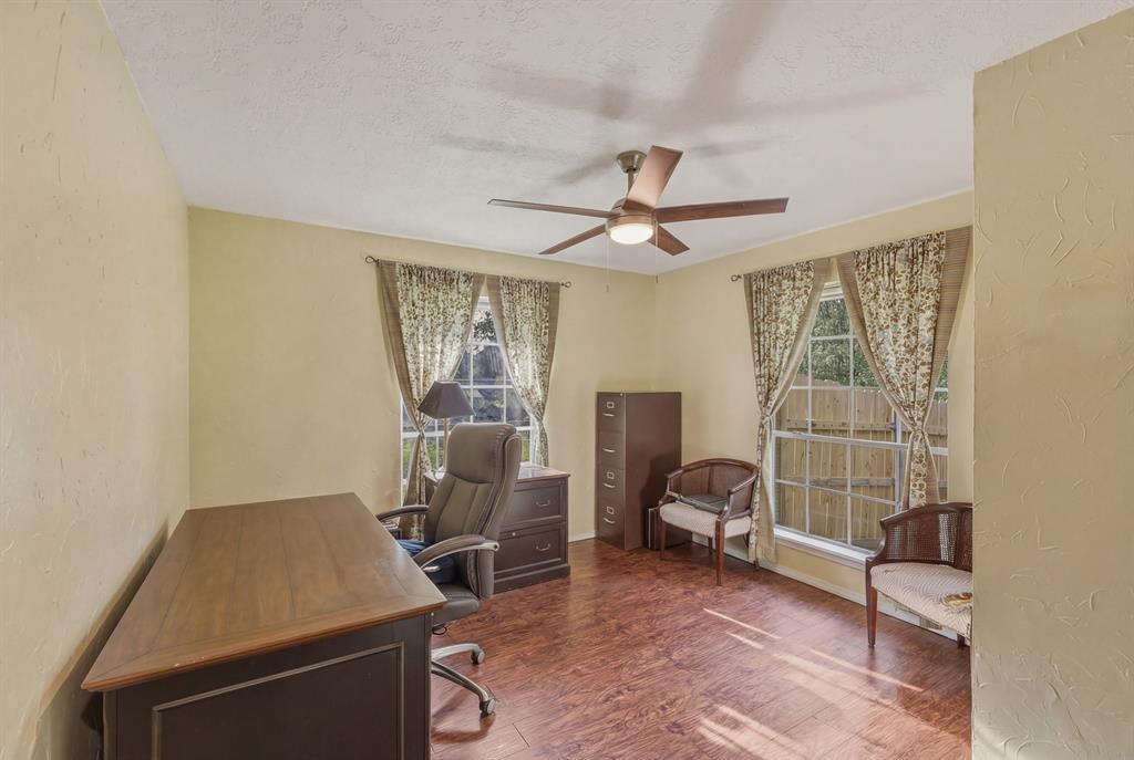 10203 Crestview Drive Tyler, TX 75707 - Photo 16 of 25 a work room with furniture and a ceiling fan