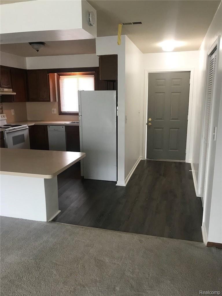 2229 North Milford Road Highland, MI 48357 - Photo 7 of 25 Beautiful New Flooring