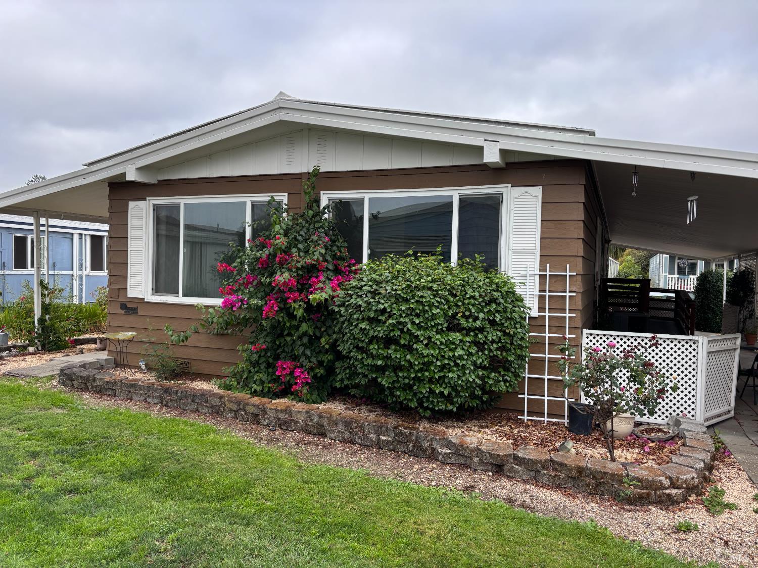 front view of a house with a yard