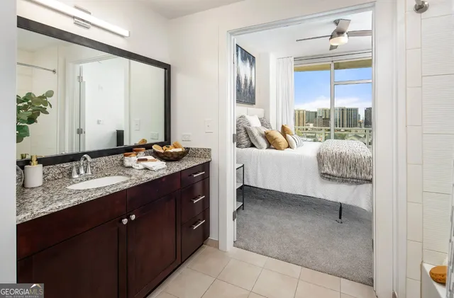 a view of a hallway with washer and dryer